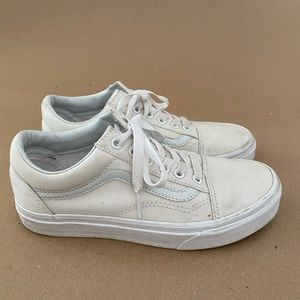 All-white Vans Old Skool sneakers